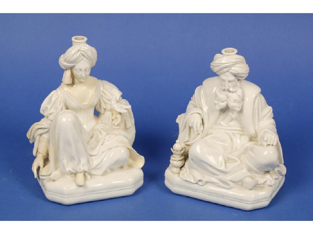 Appraisal: A PAIR OF JACOB PETIT WHITE PORCELAIN FIGURES of an