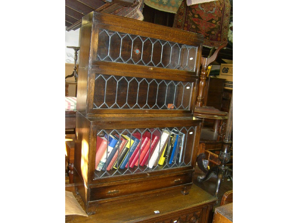 Appraisal: Two oak book cases one -tier one -tier with up-and-over