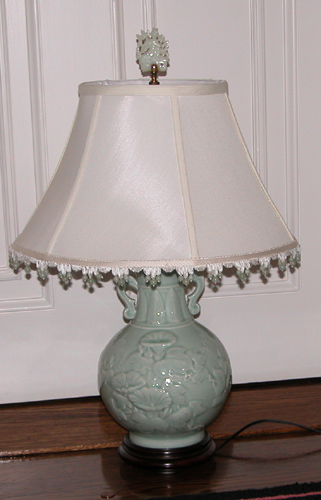 Appraisal: Chinese Celadon Pottery Lamp with a White Jade Finial th