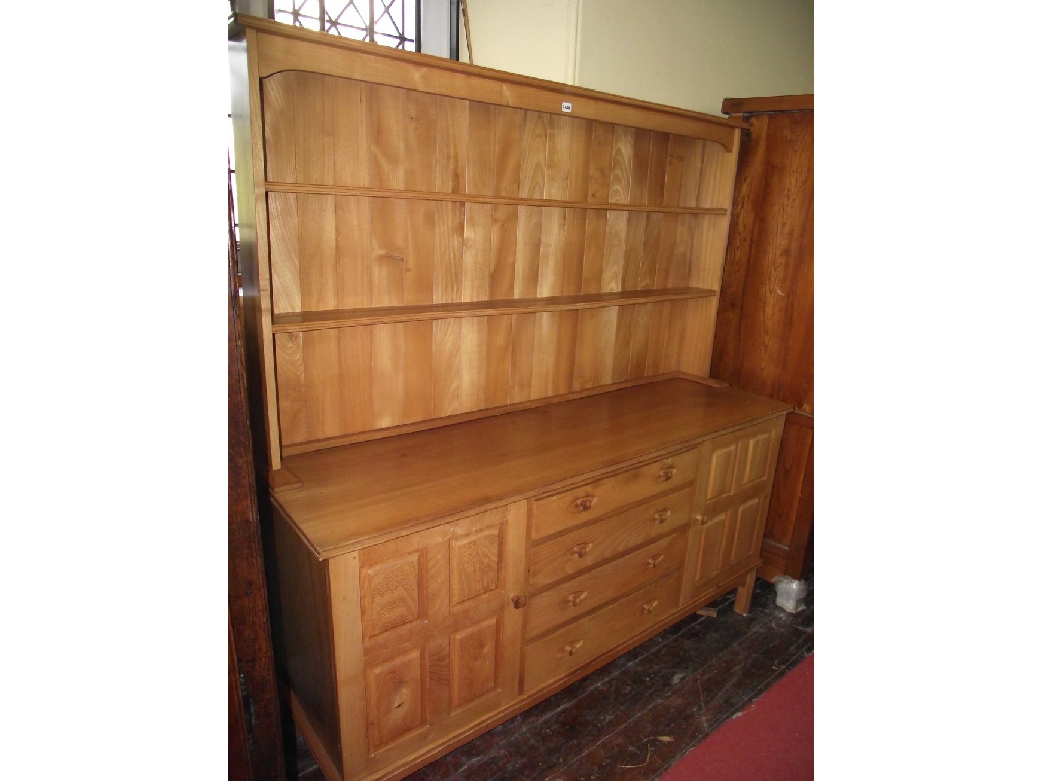 Appraisal: A good quality contemporary elm dresser and plate rack in