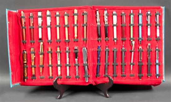 Appraisal: Thirty-two assorted ballpoint pens in folding cloth-carrying case Estimate -