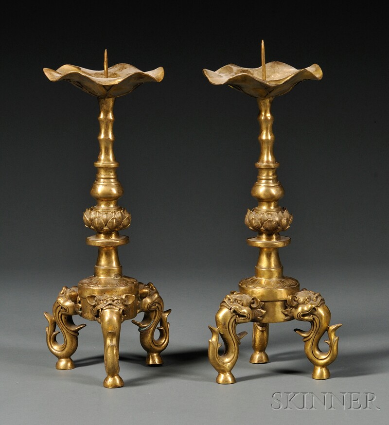 Appraisal: Pair of Bronze Pricket Candlesticks th century drip pan formed