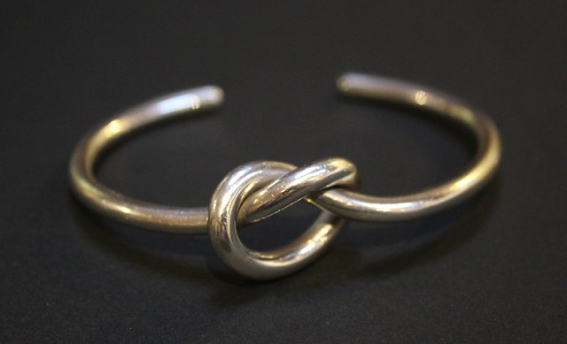 Appraisal: Andreas Mikkelsen Danish - for Georg Jensen'Knot' silver banglenumbered A