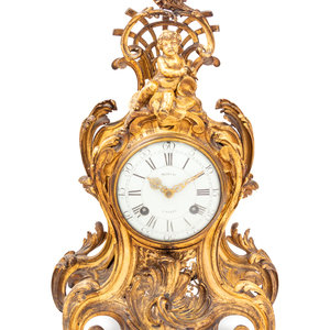 Appraisal: A Louis XV Gilt Bronze Clock and Stand Jean Moisy