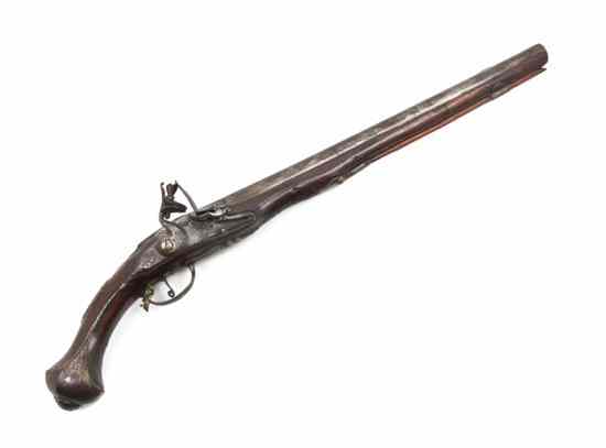 Appraisal: A Flint Lock Pistol having a walnut fitting and iron