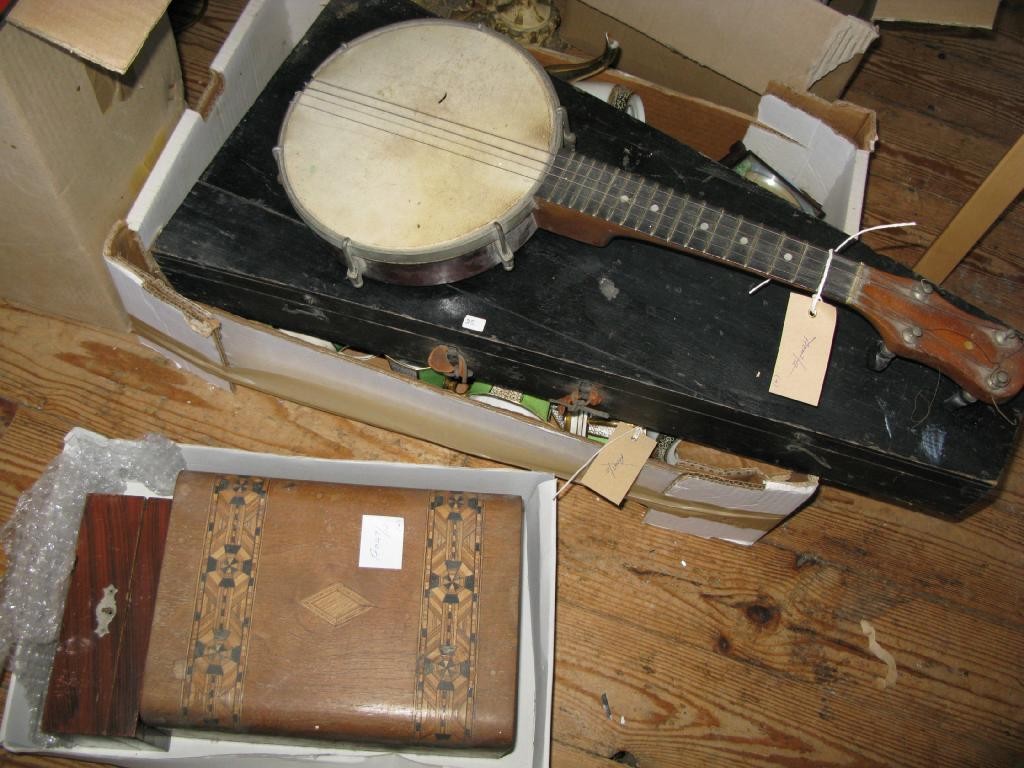 Appraisal: A banjo a cased mandolin Victorian walnut box and one