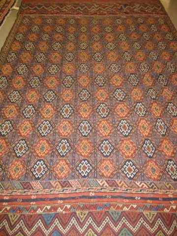 Appraisal: Handmade Persian Rug overall triangulardesigns flat weave semi-antique animal signature