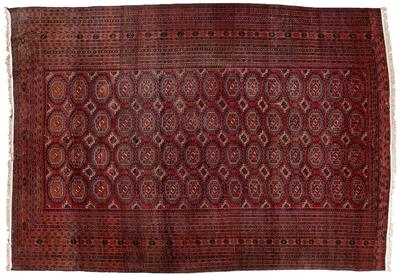 Appraisal: Turkoman rug repeating rows of turreted guls with extensive repeating