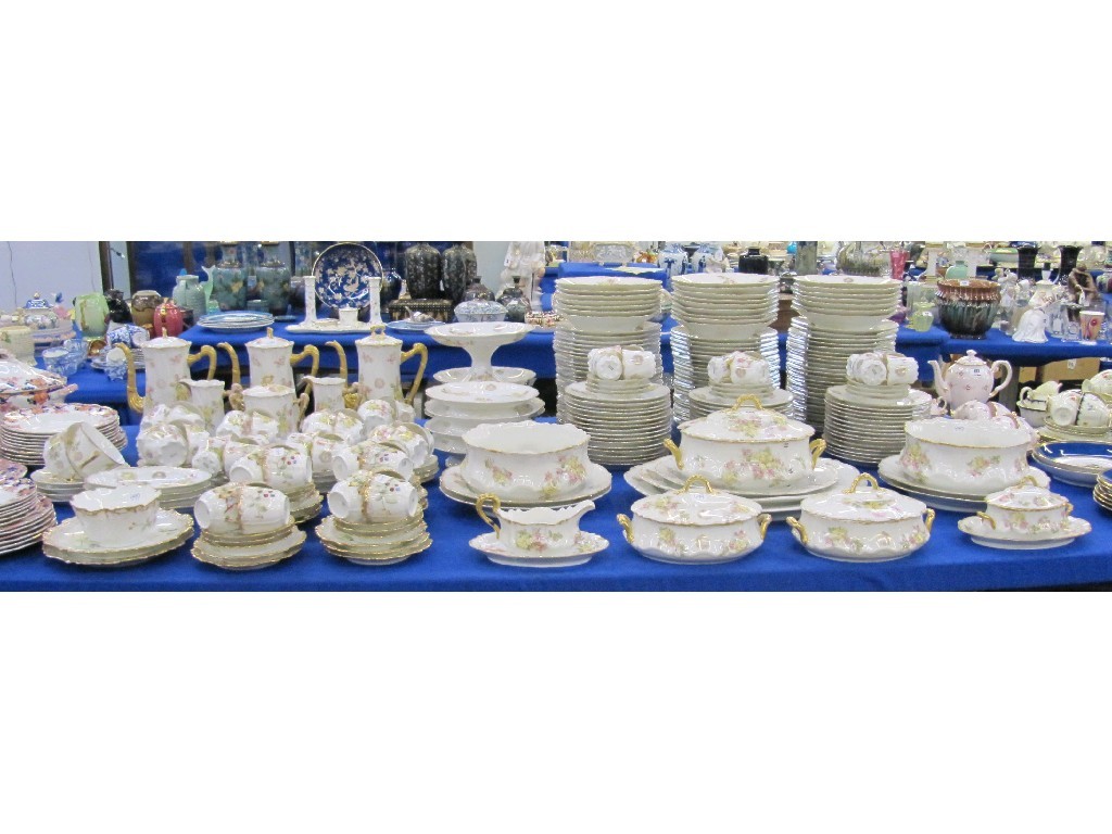 Appraisal: Extensive Limoges tea and dinnerset each piece transferprinted with flowers