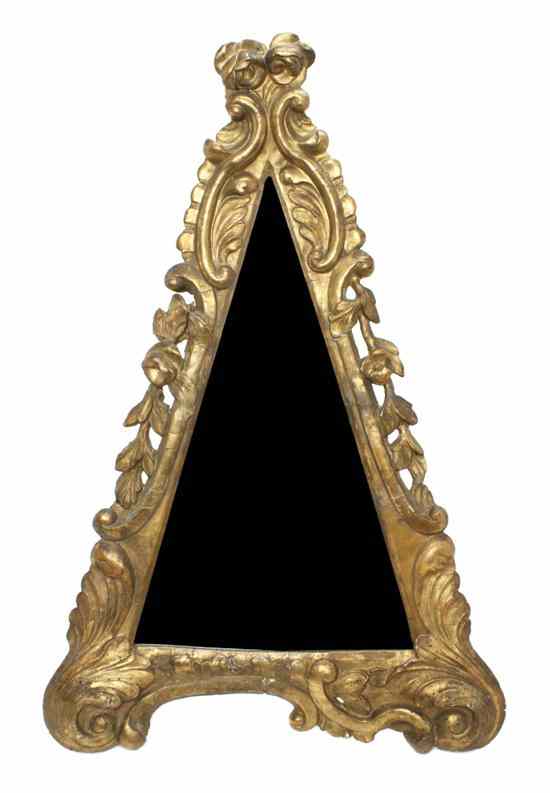 Appraisal: A Rococo Style Scroll Carved Giltwood Mirror th century of