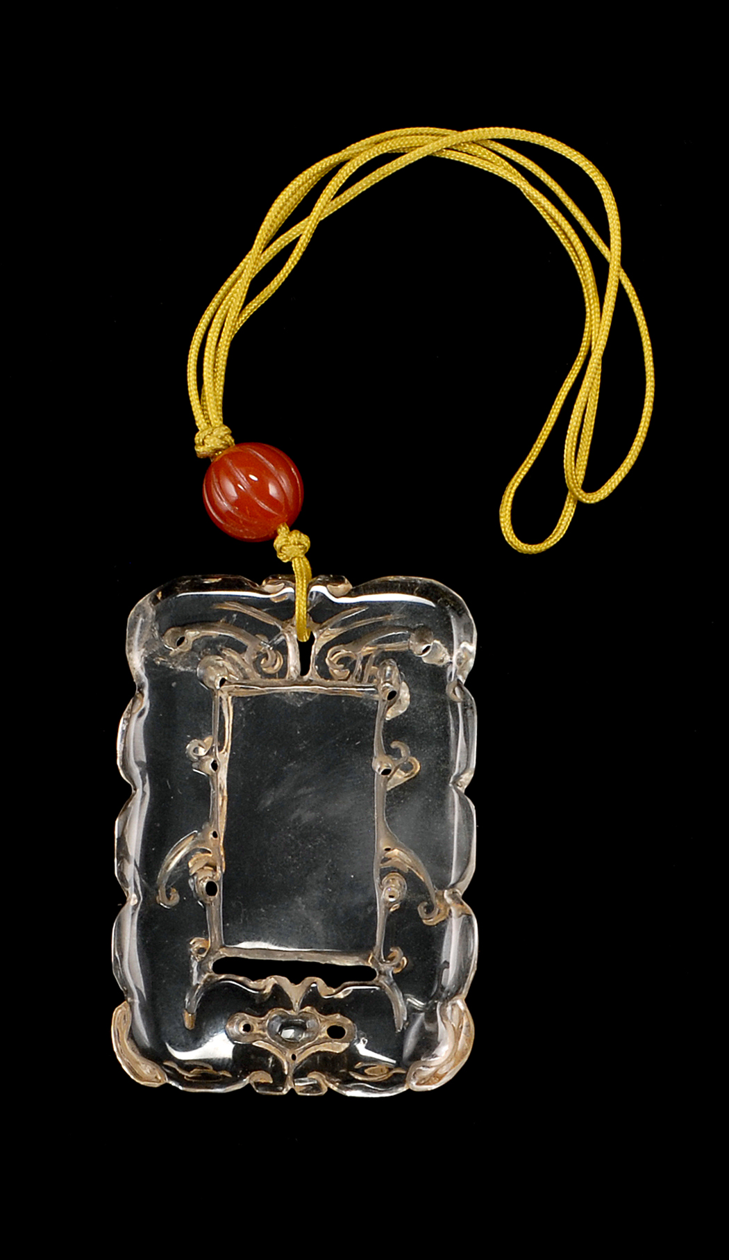 Appraisal: ROCK CRYSTAL PENDANT Early th CenturyIn rectangular form with stylized