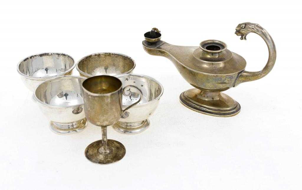 Appraisal: A SET OF FOUR GEORGE V SALT CELLARS of plain