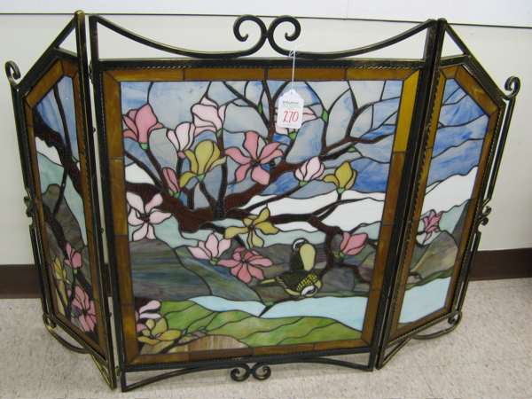 Appraisal: A SCENIC STAINED AND LEADED GLASS THREE PANEL FIRESCREEN with