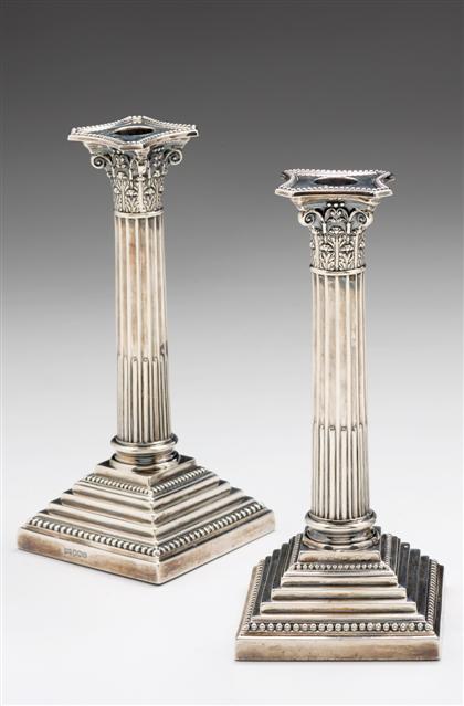 Appraisal: Pair of George V silver candlestickswalker and hall sheffield