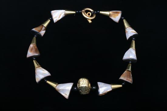 Appraisal: CONTEMPORARY DESIGNER MOTHER-OF-PEARL BEAD NECKLACE BY SYLVIA GOTTWALD Large triangular