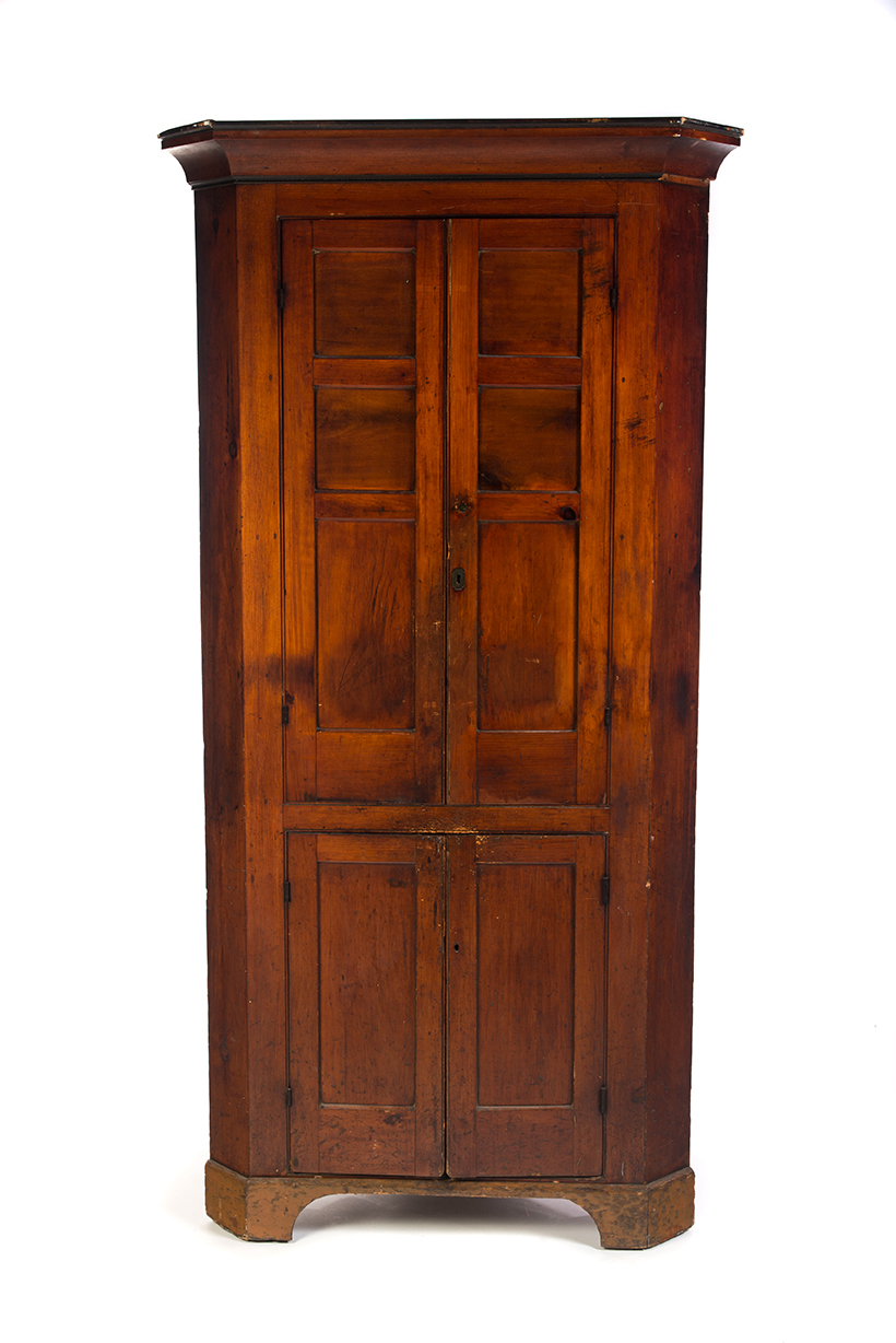 Appraisal: ONE-PIECE CORNER CUPBOARD American th century Coved cornice two three-panel