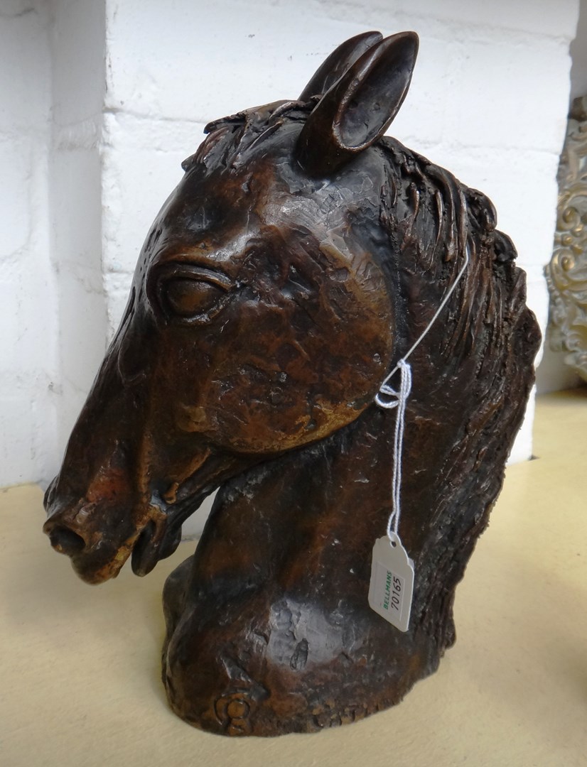 Appraisal: A bronze head of a horse of recent manufacture indistinctly