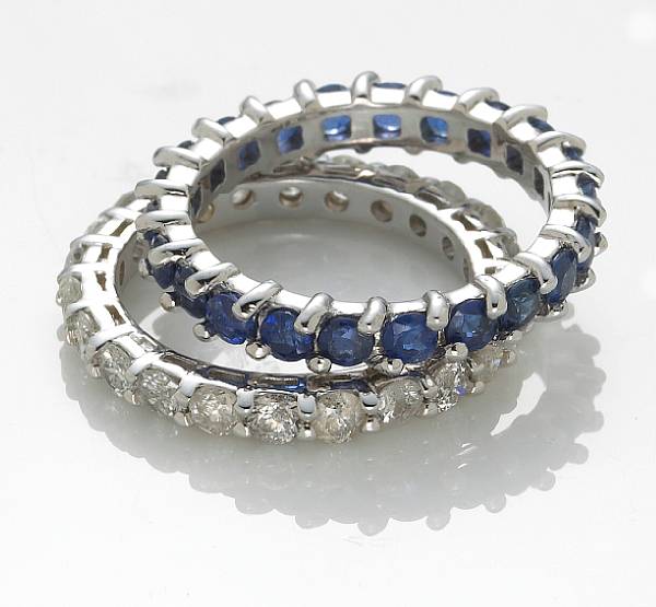 Appraisal: A pair of sapphire diamond and k white gold eternity