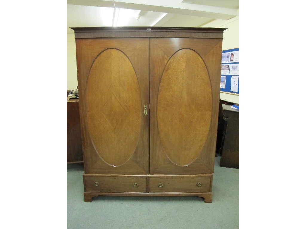 Appraisal: Edwardian mahogany two door wardrobe