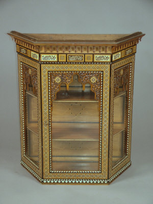 Appraisal: A Moorish heavily inlaid wall cabinet th century of canted