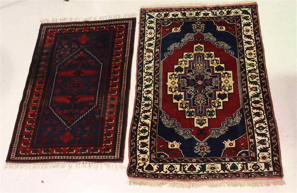 Appraisal: TWO MEDALLION RUGS blue red beige on left approx '