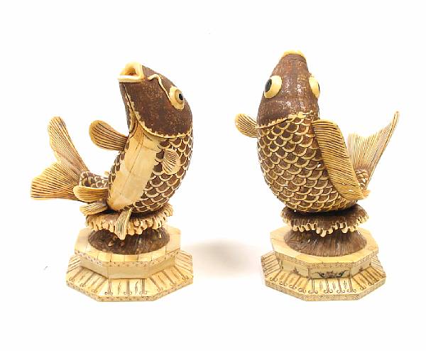 Appraisal: A pair of Chinese carved bone veneer fish figures height