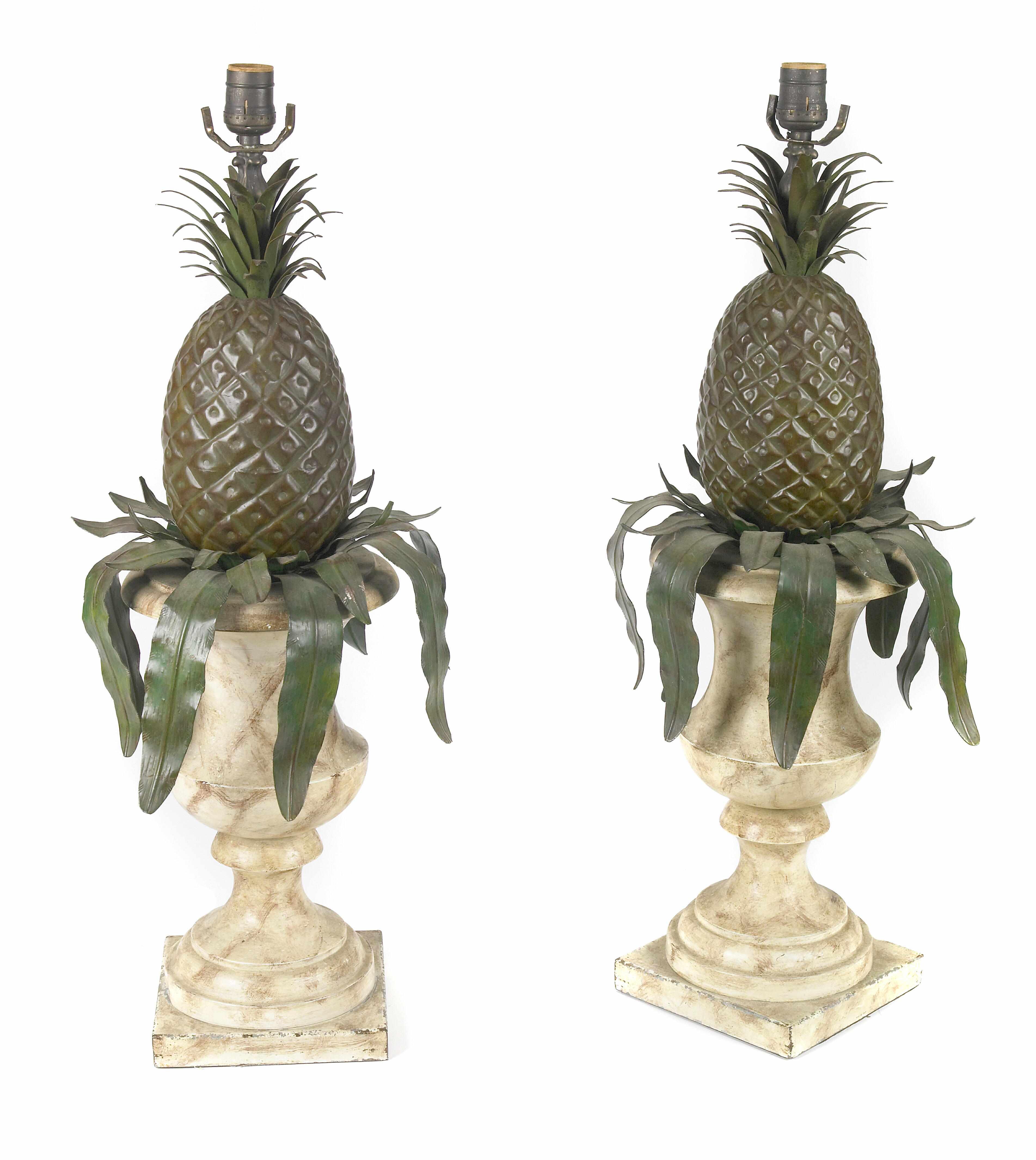 Appraisal: A pair of whimsical tle peinte pineapple form table lamps