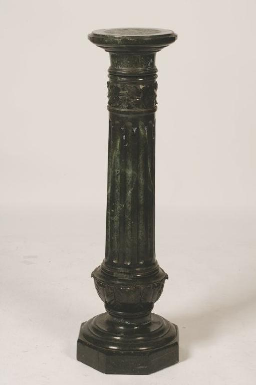 Appraisal: A GREEN MARBLE PEDESTAL with a circular top on a