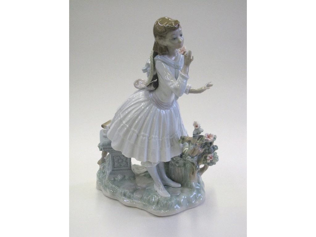 Appraisal: Large Lladro figure of a girl smelling a flower