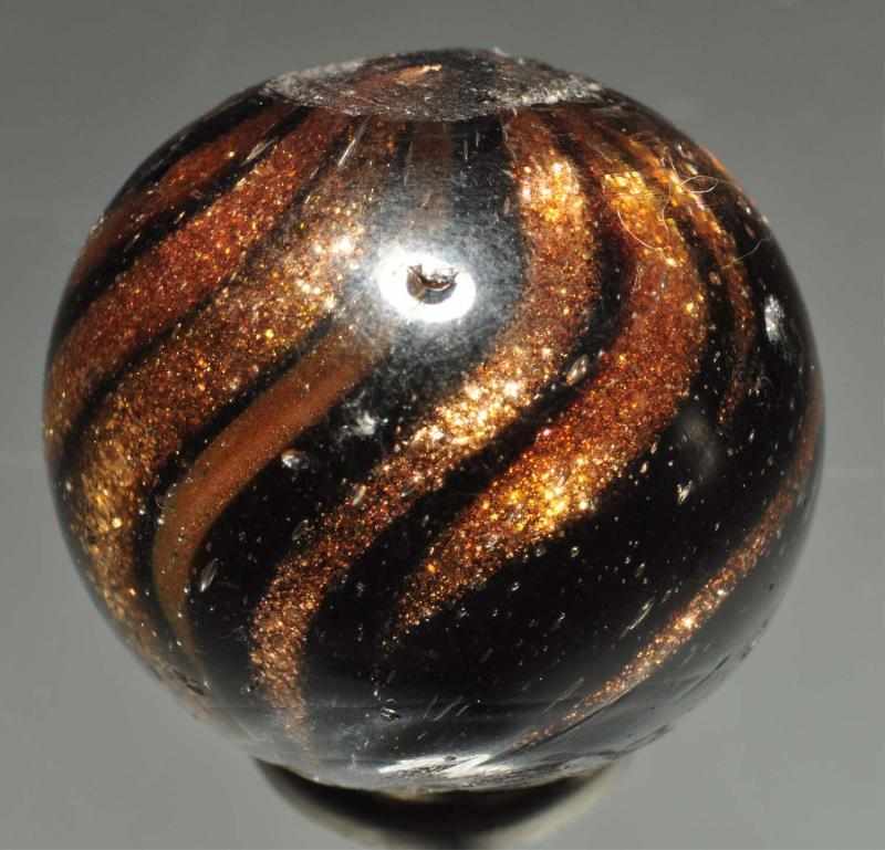 Appraisal: Black Glass Lutz Marble Description Solid black opaque base overlaid