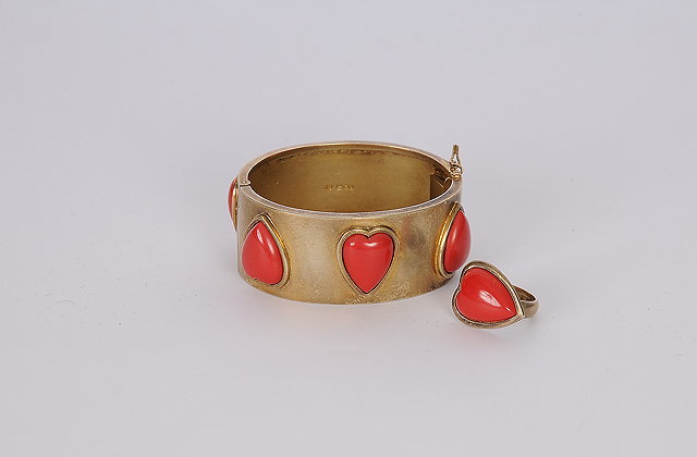 Appraisal: A silver gilt bracelet and ring with a red coral