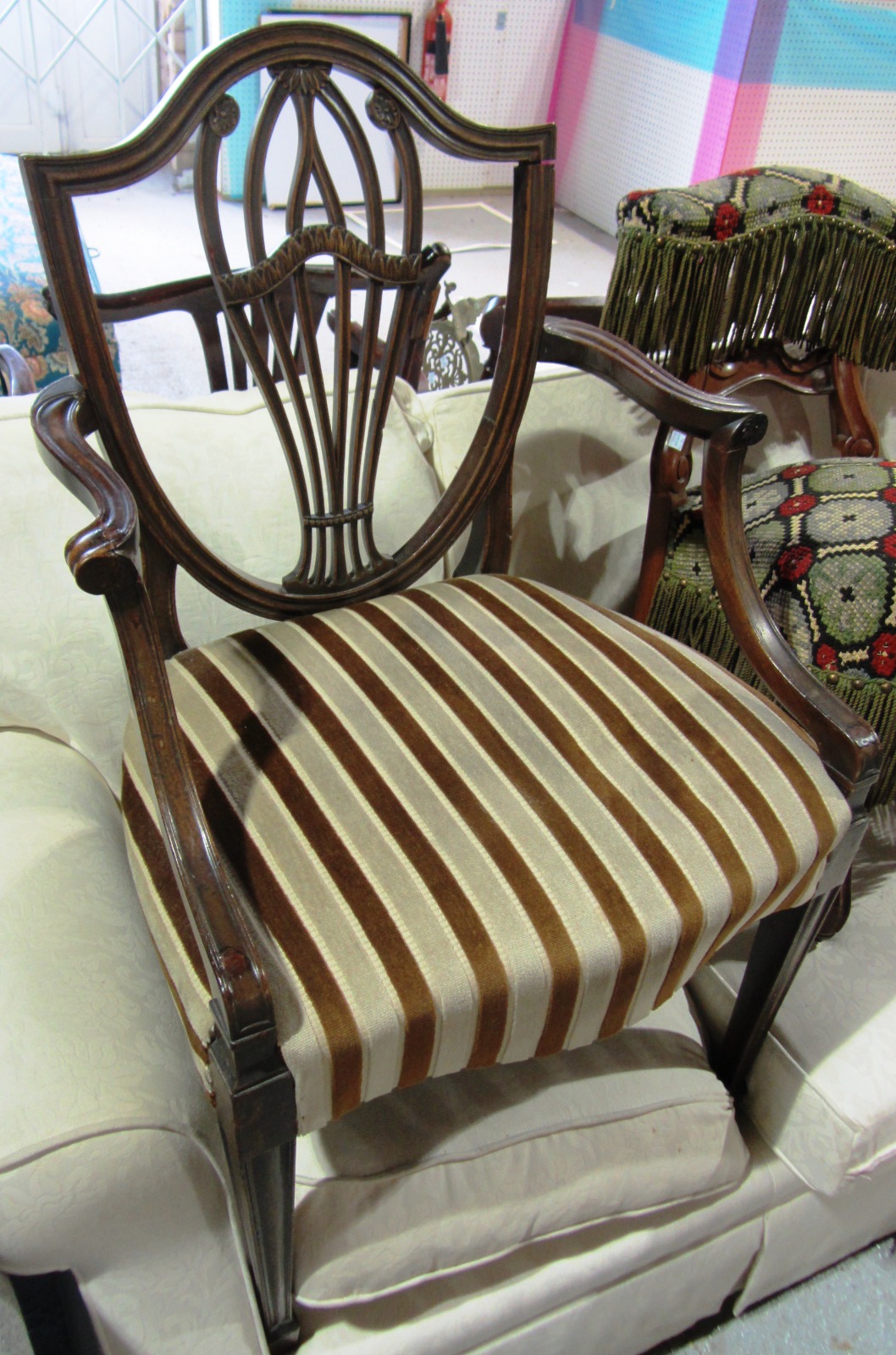 Appraisal: A George III mahogany open armchair