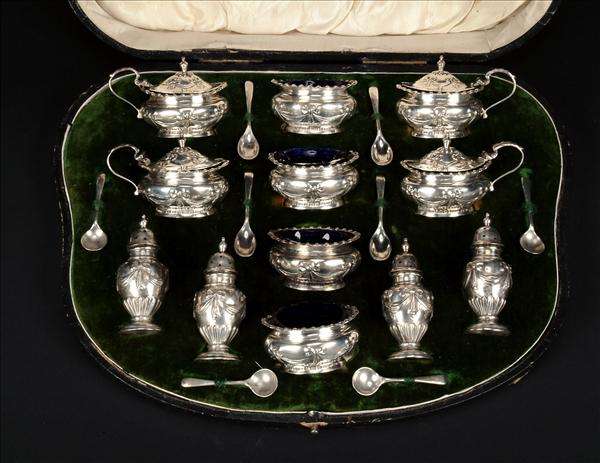 Appraisal: A silver twelve piece cruet set by Walker Hall Sheffield