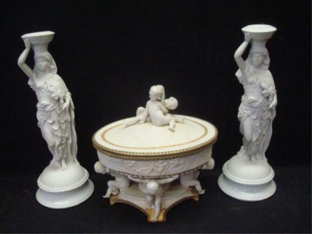 Appraisal: Parian Porcelain Pieces Lidded centerpiece and a pair of candlebra