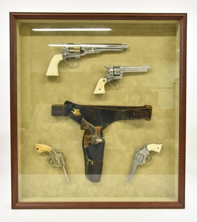 Appraisal: Shadow box framed reproduction hand gun collection some signed Buffalo