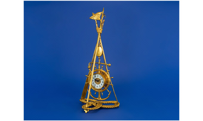 Appraisal: Reproduction Clock In the form of a ship's wheel and