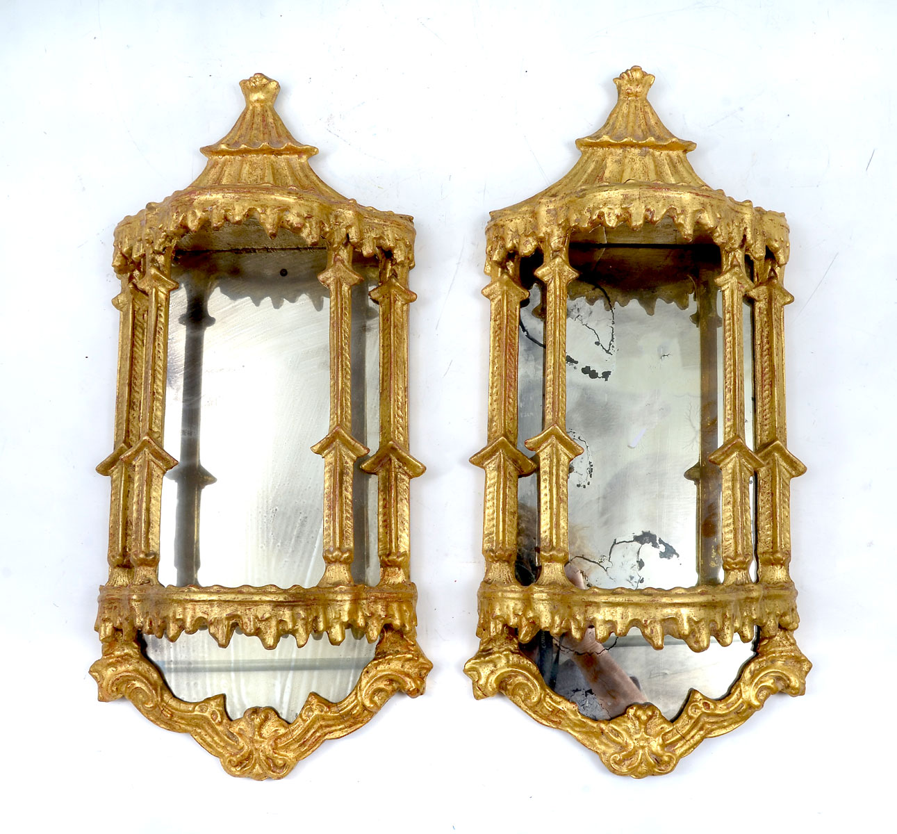 Appraisal: PAIR OF CARVED GILT WALL SHELVES carved gilt wall shelves