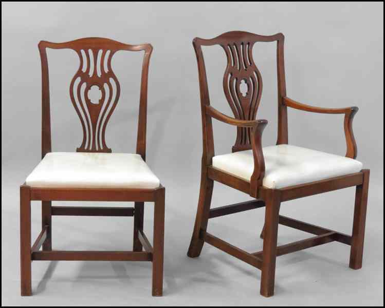 Appraisal: MAHOGANY DINING SUITE Comprised of a table eight side chairs