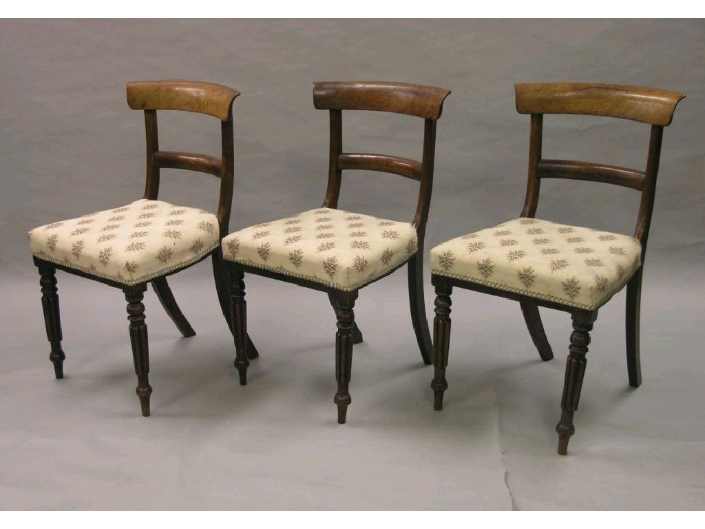 Appraisal: A set of six William IV rosewood dining chairs overhanging