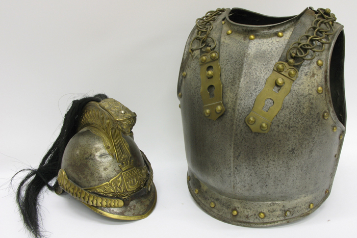 Appraisal: FRENCH CERIMONIAL PATTERN DRAGOON HELMET AND CUIRASS iron helmet with