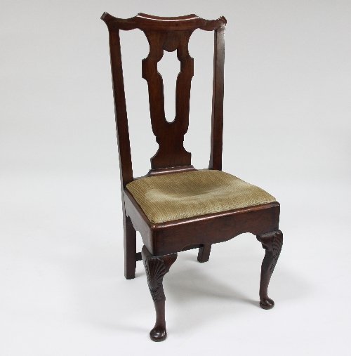 Appraisal: A George II walnut chair with pierced vase shaped splat