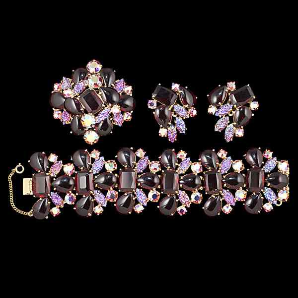 Appraisal: Schaparrelli Collection of Costume Jewelry A three piece Schanparrelli collection