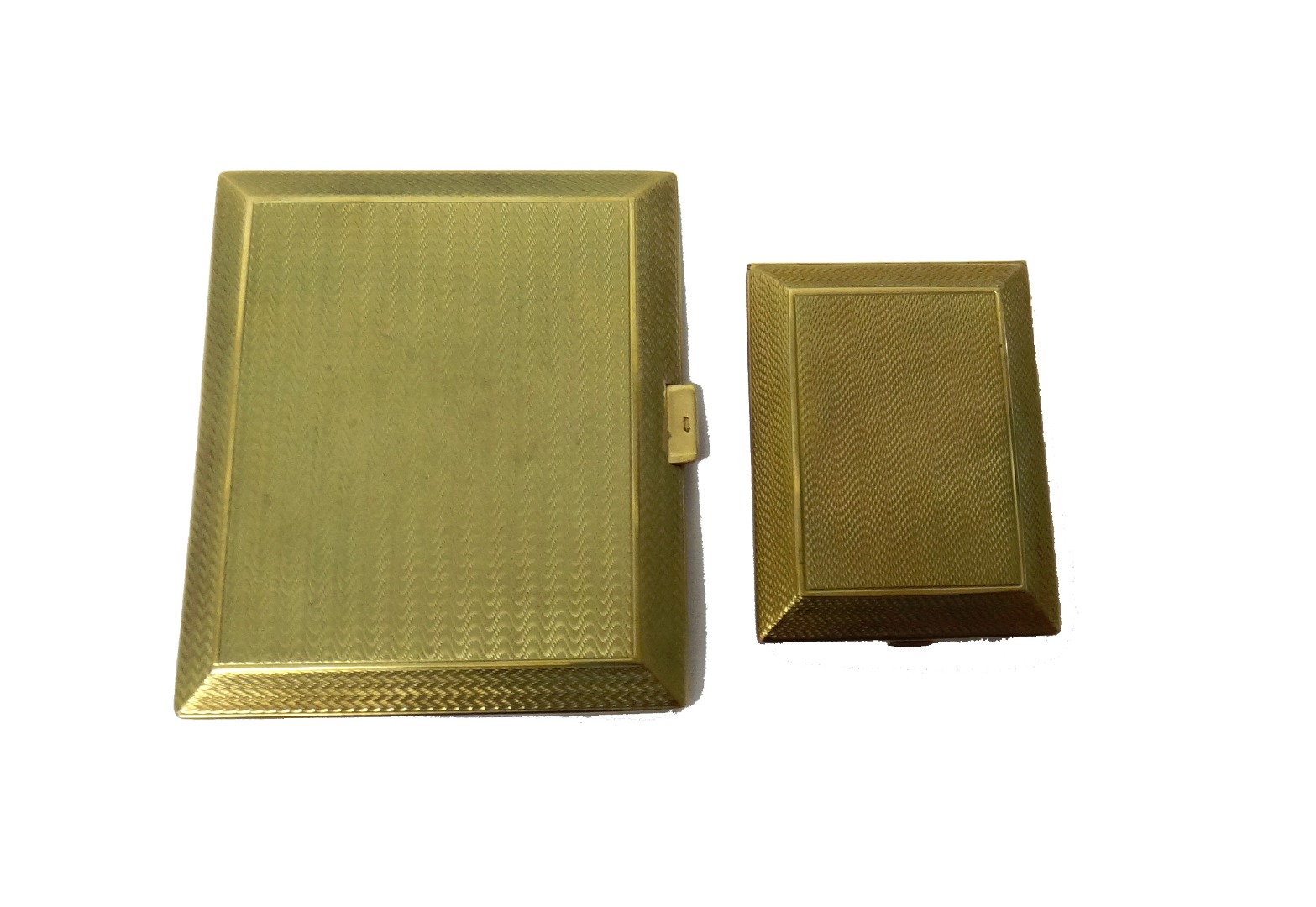 Appraisal: A ct gold rectangular cigarette case with engine turned decoration