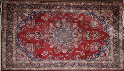 Appraisal: PERSIAN ROSE-GROUND MEDALLION CARPET ft in x ft in