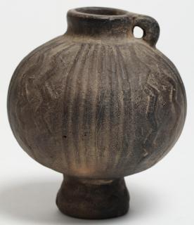 Appraisal: Archaic Small Black Pottery Jug Possibly Pre-Columbian or Near Eastern