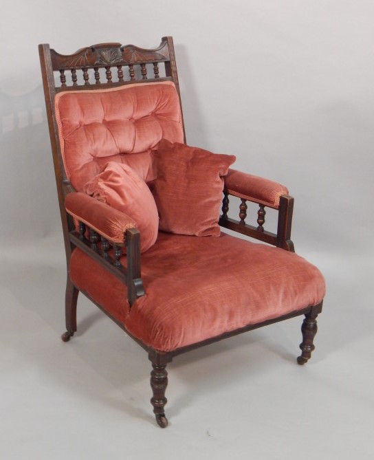 Appraisal: A late thC walnut open armchair upholstered in pink dralon