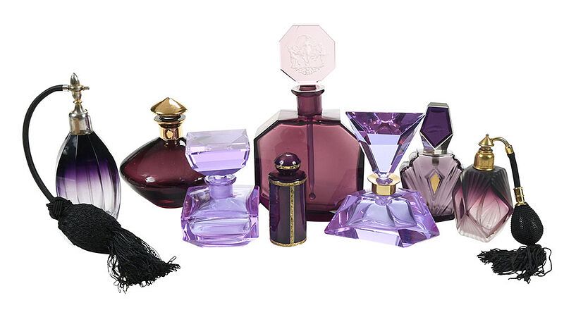 Appraisal: Eight Amethyst Glass Perfume and Cologne Bottles Continental late th