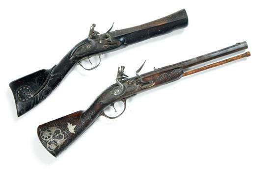 Appraisal: TWO FLINTLOCK COACH GUNS Middle Eastern th century A blunderbuss