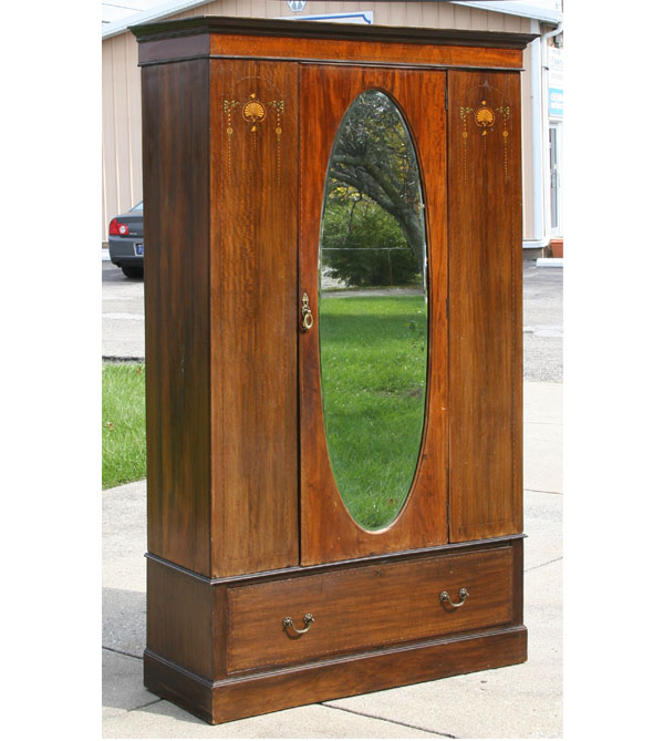 Appraisal: English inlaid wardrobe four piece break down mirrored door drawer