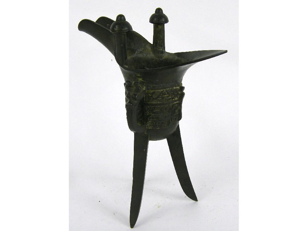 Appraisal: Unusual Japanese helmet shaped bronze wine vessel the shaped rim